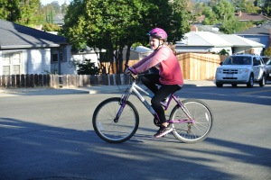 Creekside Middle School Student Megan Baldwin riding her bike in the bike safety class.